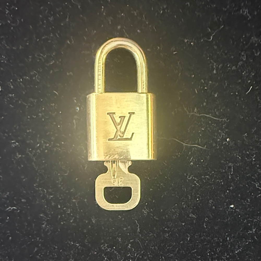 Louis Vuitton Elegant Gold Padlock